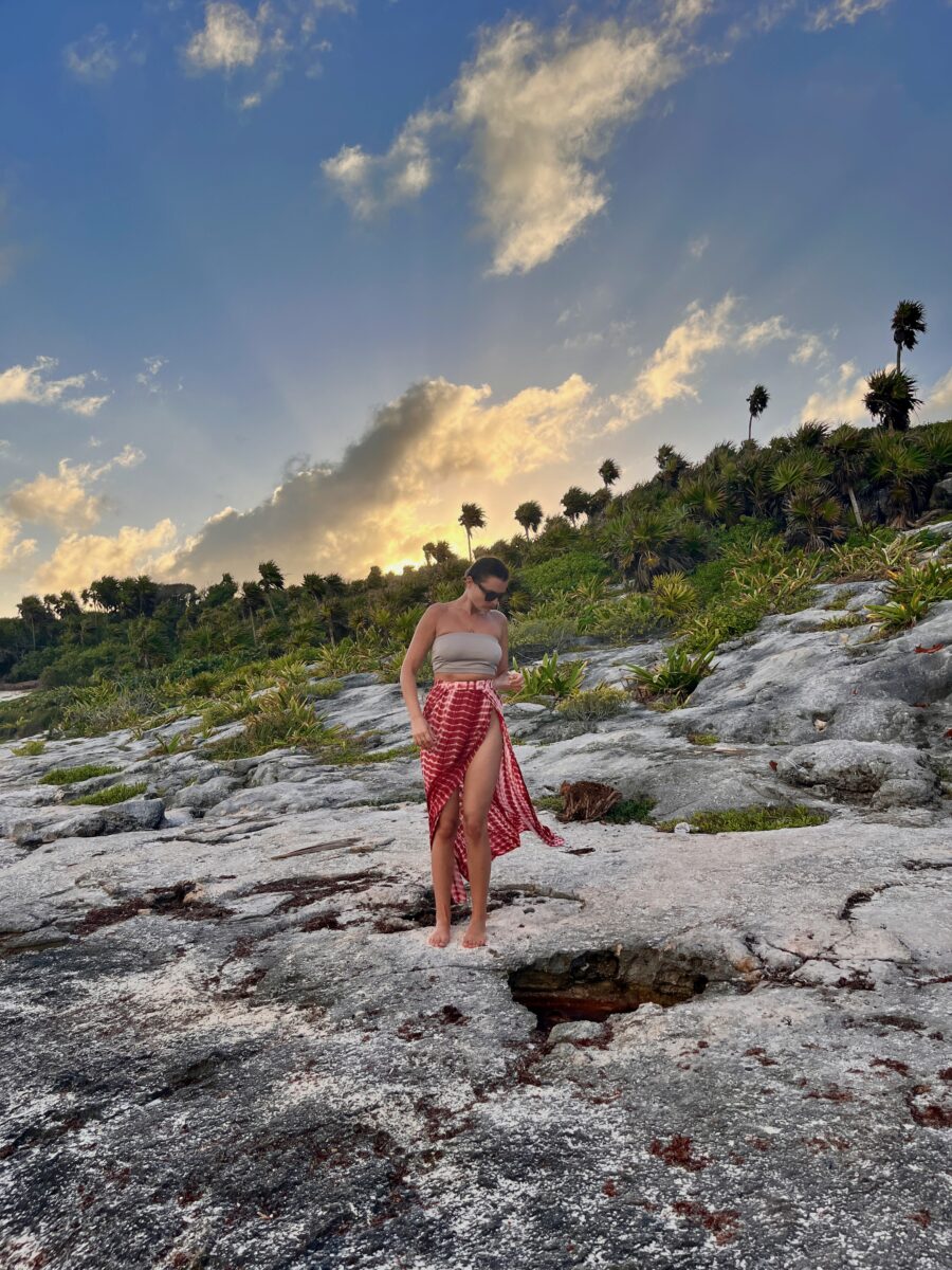 a woman on the beach of Tulum, Mexico