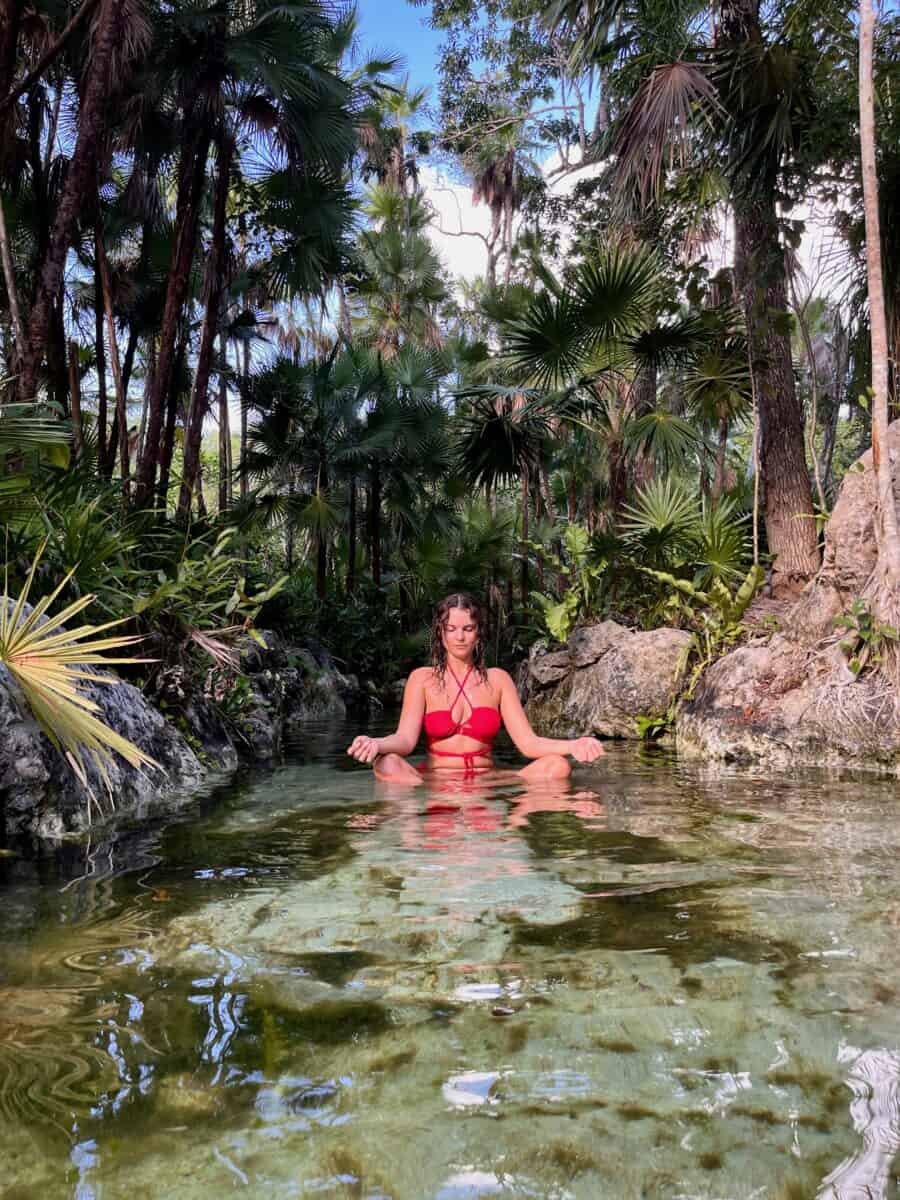 Sophie Pomme meditating in the jungle