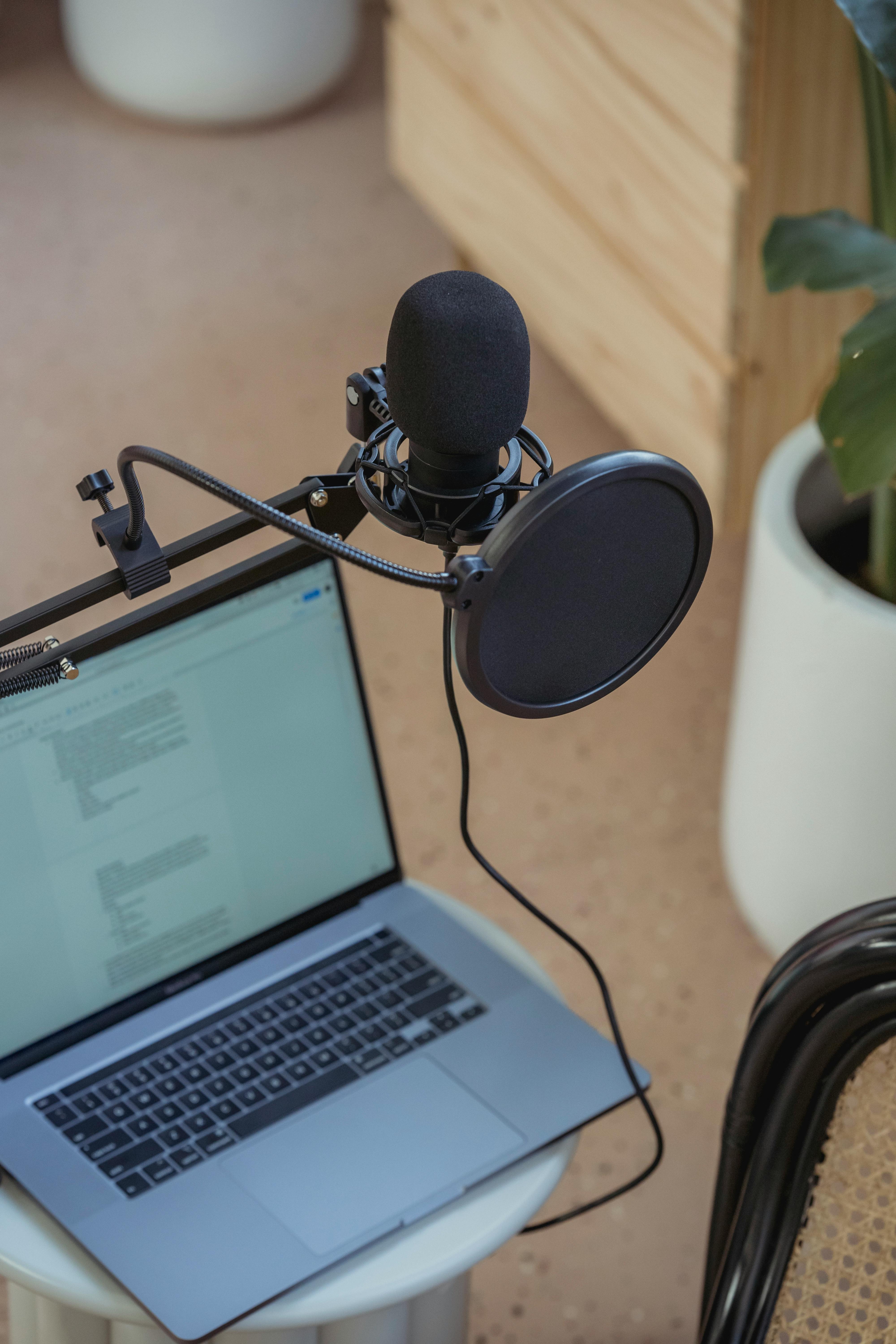 a microphone for podcasts with a laptop