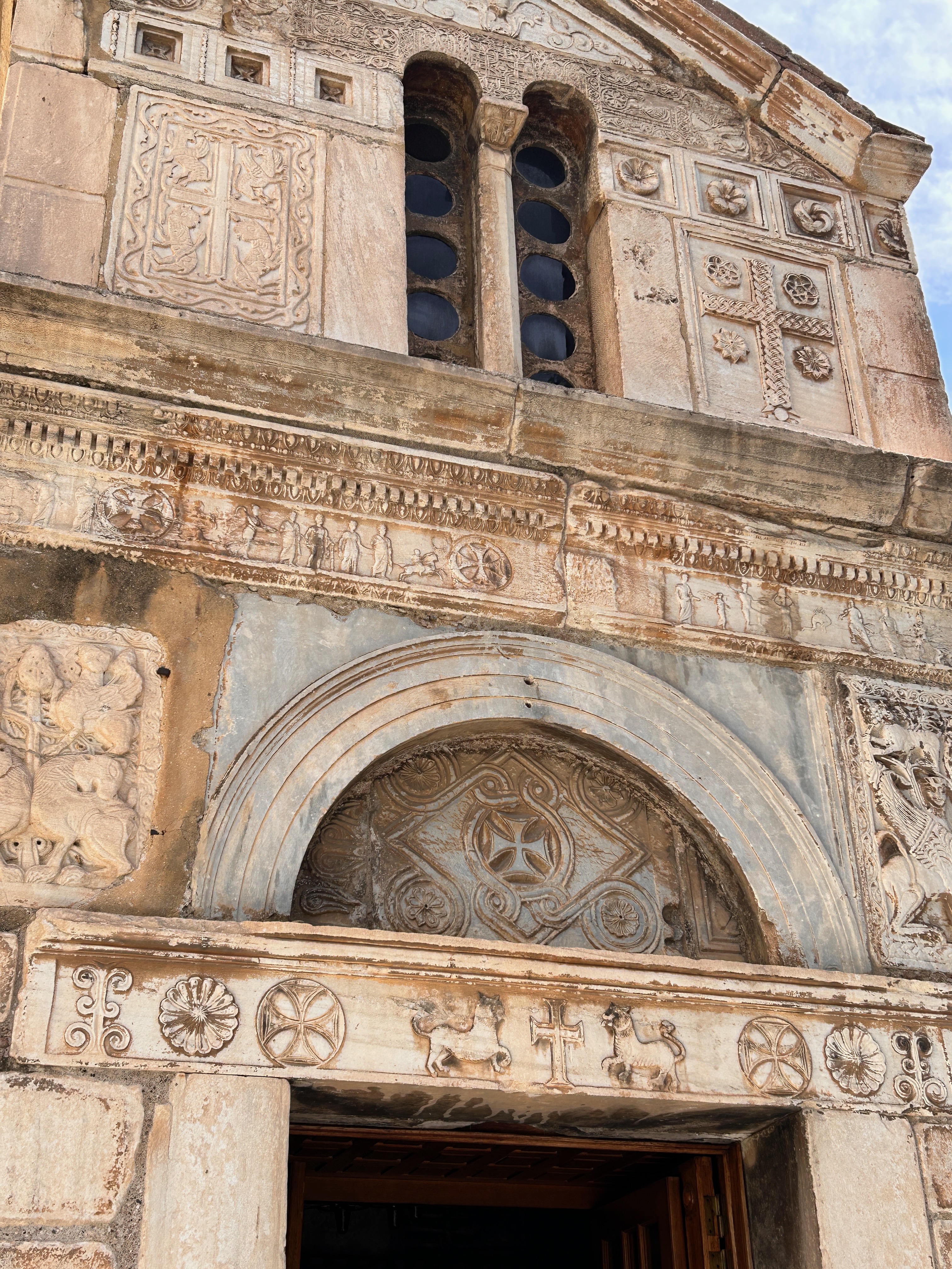 the facade of an old building in Athens