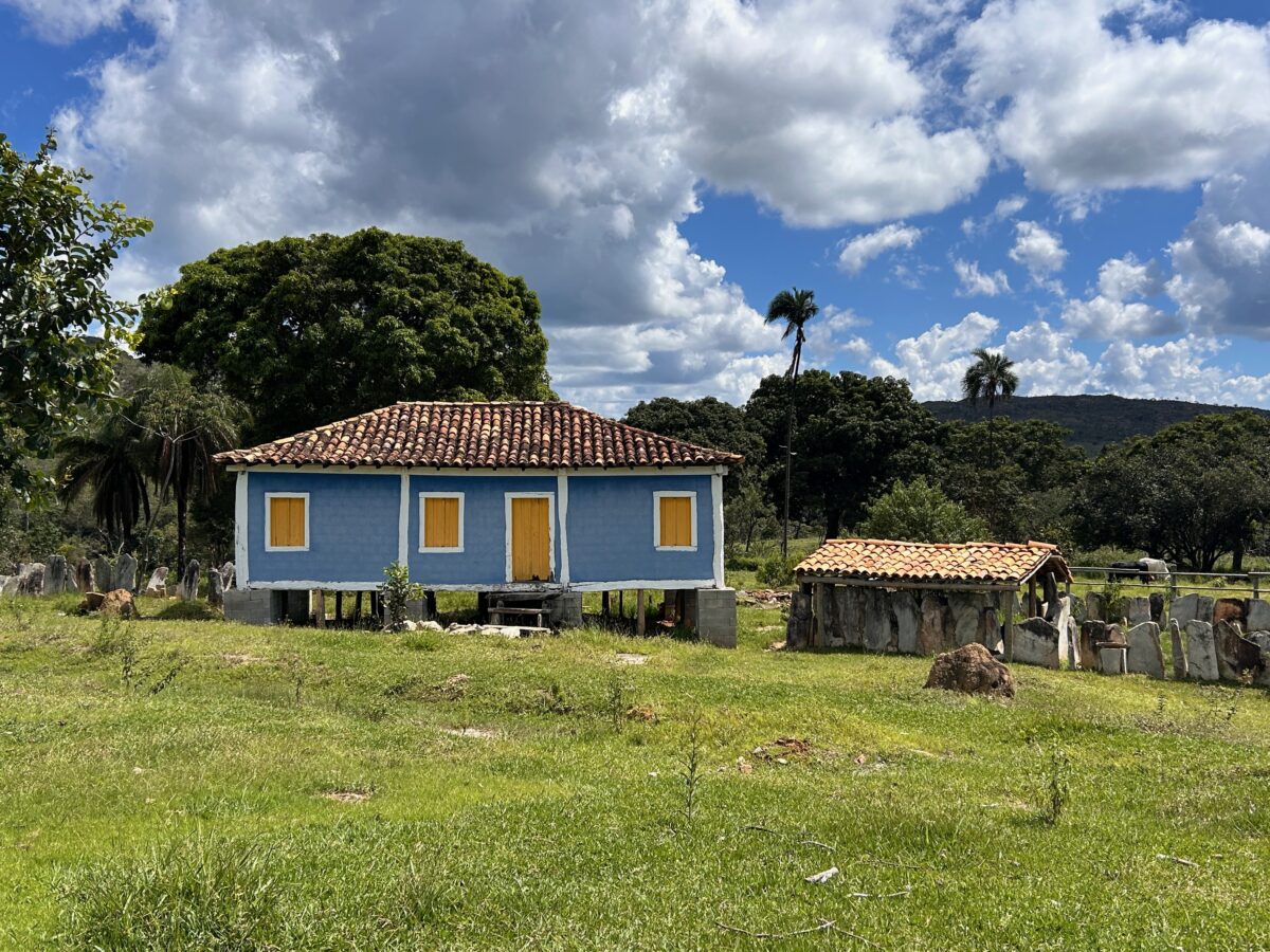 A blue and yellow traditional house in the mountains of Serra do Cipo in Minas Gerais, Brazil.